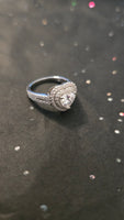 Timeless Embrace – 1.5ct Halo Heart Ring