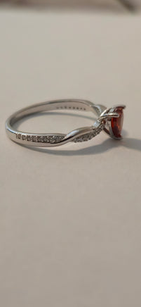 Crimson Twist red CZ heart ring – side angle