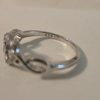 Infinite Love – 1mm CZ Halo Heart Ring